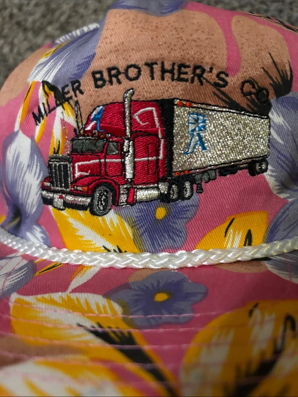 Floral Miller Brothers Co. Trucker Hat with Embroidered Semi Truck